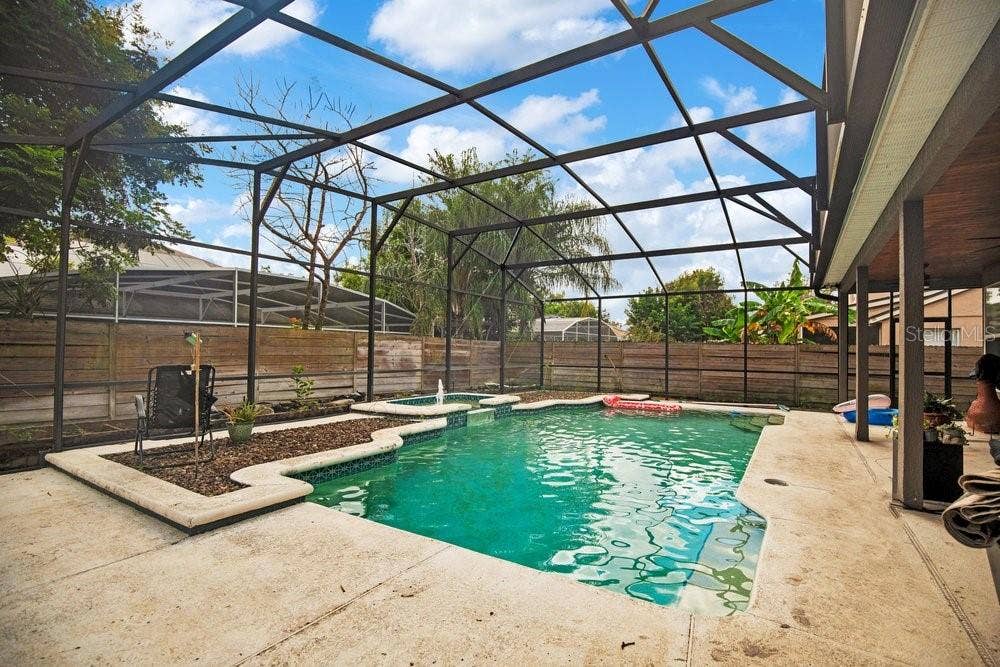 3743 GATLIN WOODS DRIVE, Orlando, FL 32812 Enclosed Pool and Patio