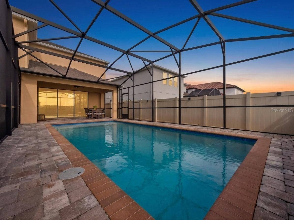 9043 HORIZON POINTE TRAIL, Windermere, FL 34786 Pool at Dusk