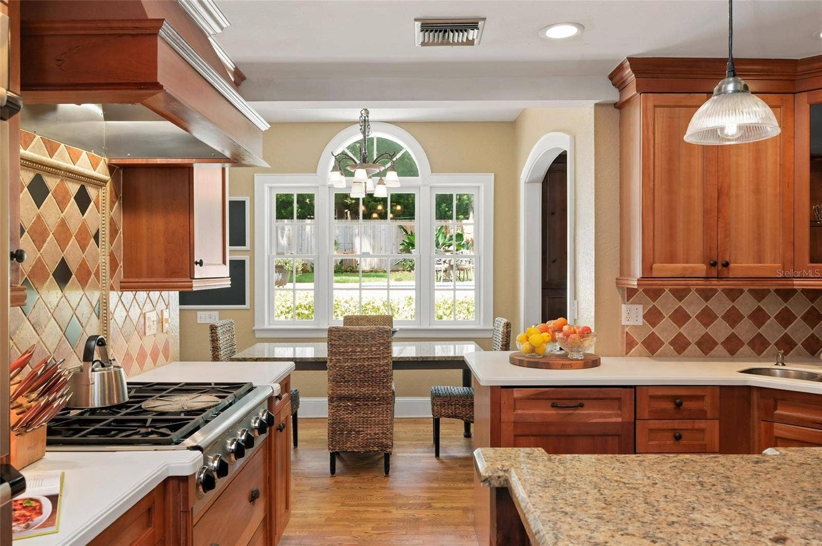 1221 DORCHESTER STREET, Orlando, FL 32803 Kitchen Connecting to Casual Dining Area
