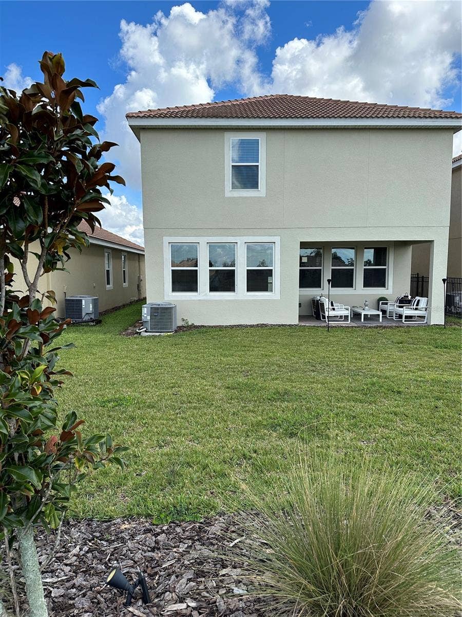 8946 FLUFFY LIE COURT, Davenport, FL 33896 Back