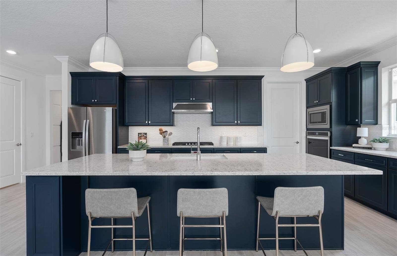 1313 ZESTY CITRUS LANE, Minneola, FL 34715 Model Home Design Only. Pictures and furnishings are for illustrative purposes only. Elevations, colors and options may vary. Furniture is for model home staging only.