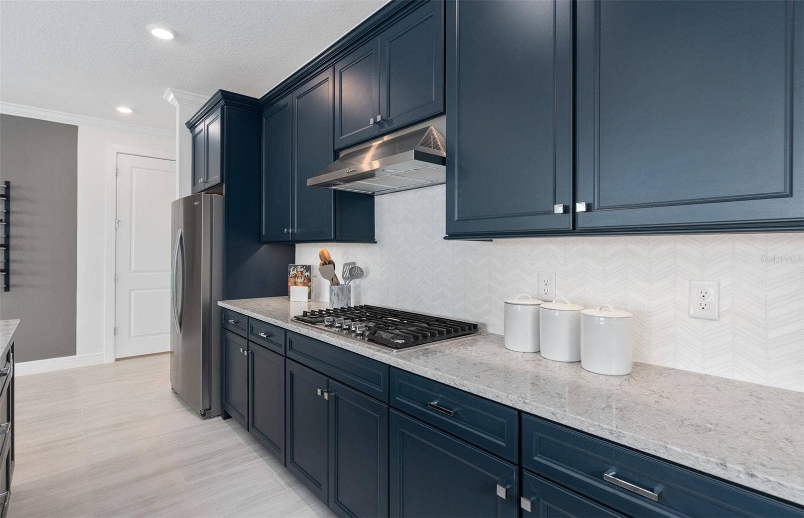1313 ZESTY CITRUS LANE, Minneola, FL 34715 Model Home Design Only. Pictures and furnishings are for illustrative purposes only. Elevations, colors and options may vary. Furniture is for model home staging only.