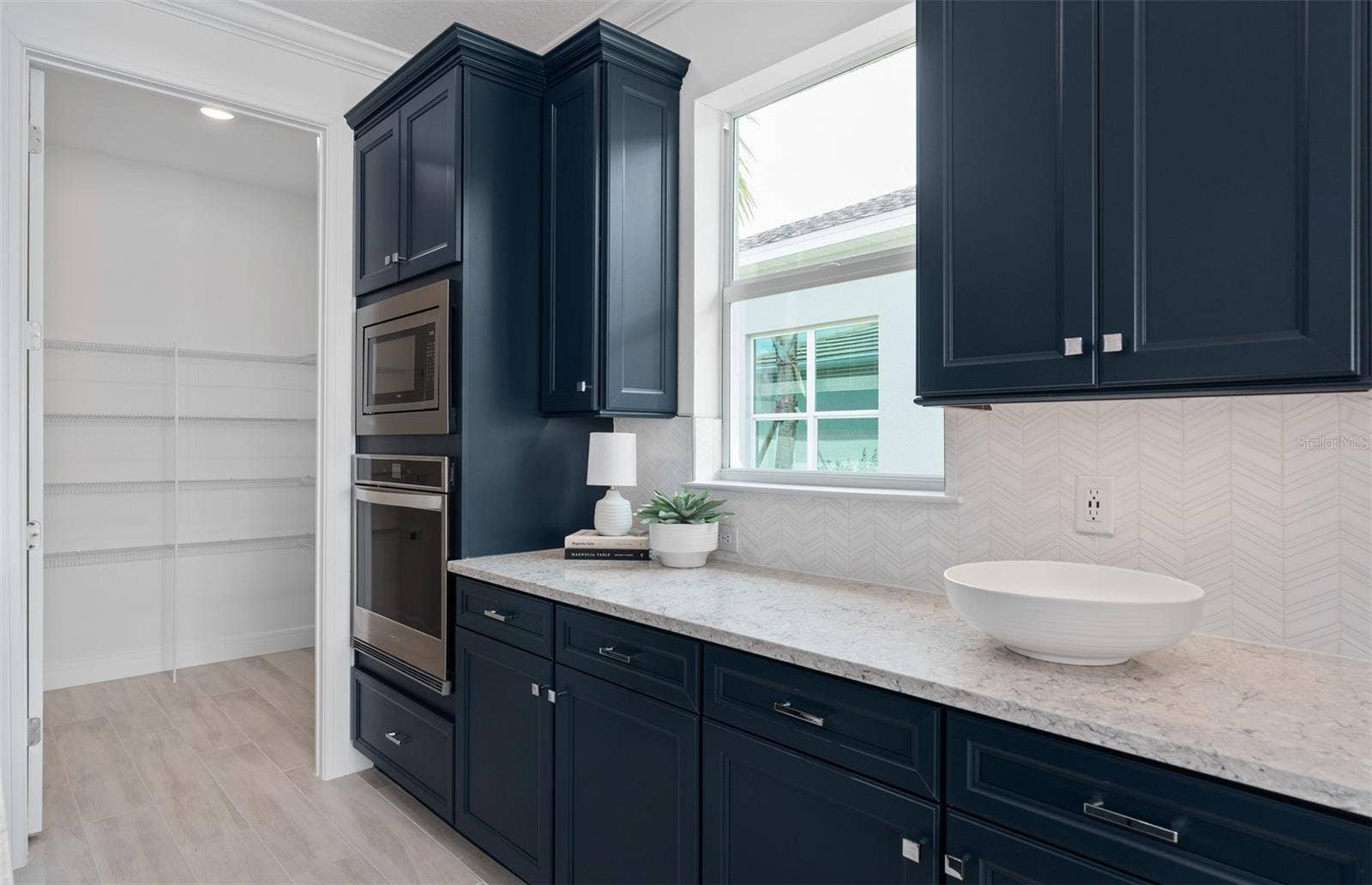 1313 ZESTY CITRUS LANE, Minneola, FL 34715 Model Home Design Only. Pictures and furnishings are for illustrative purposes only. Elevations, colors and options may vary. Furniture is for model home staging only.
