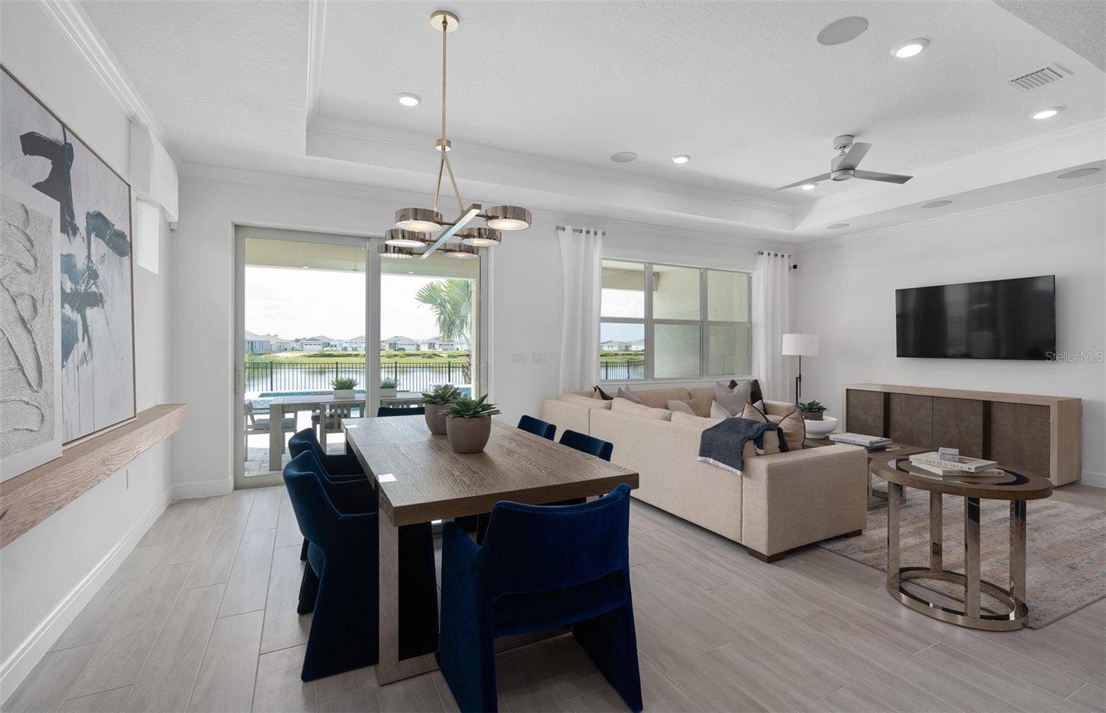 1313 ZESTY CITRUS LANE, Minneola, FL 34715 Model Home Design Only. Pictures and furnishings are for illustrative purposes only. Elevations, colors and options may vary. Furniture is for model home staging only.