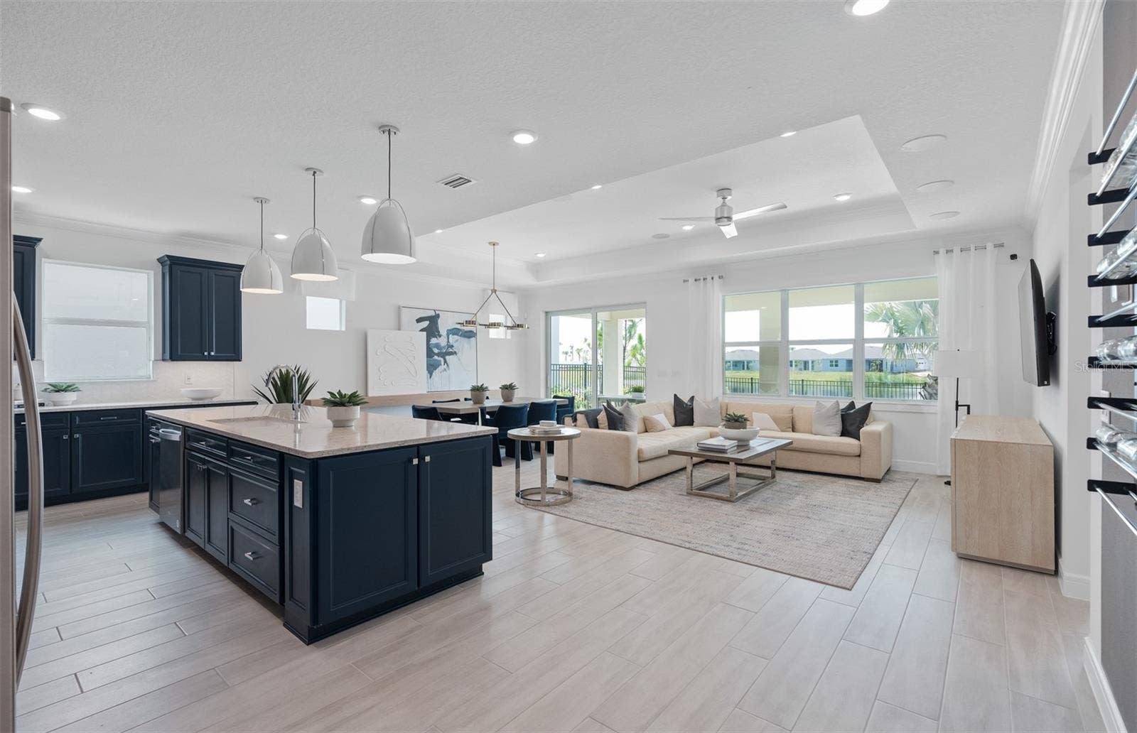 1313 ZESTY CITRUS LANE, Minneola, FL 34715 Model Home Design Only. Pictures and furnishings are for illustrative purposes only. Elevations, colors and options may vary. Furniture is for model home staging only.