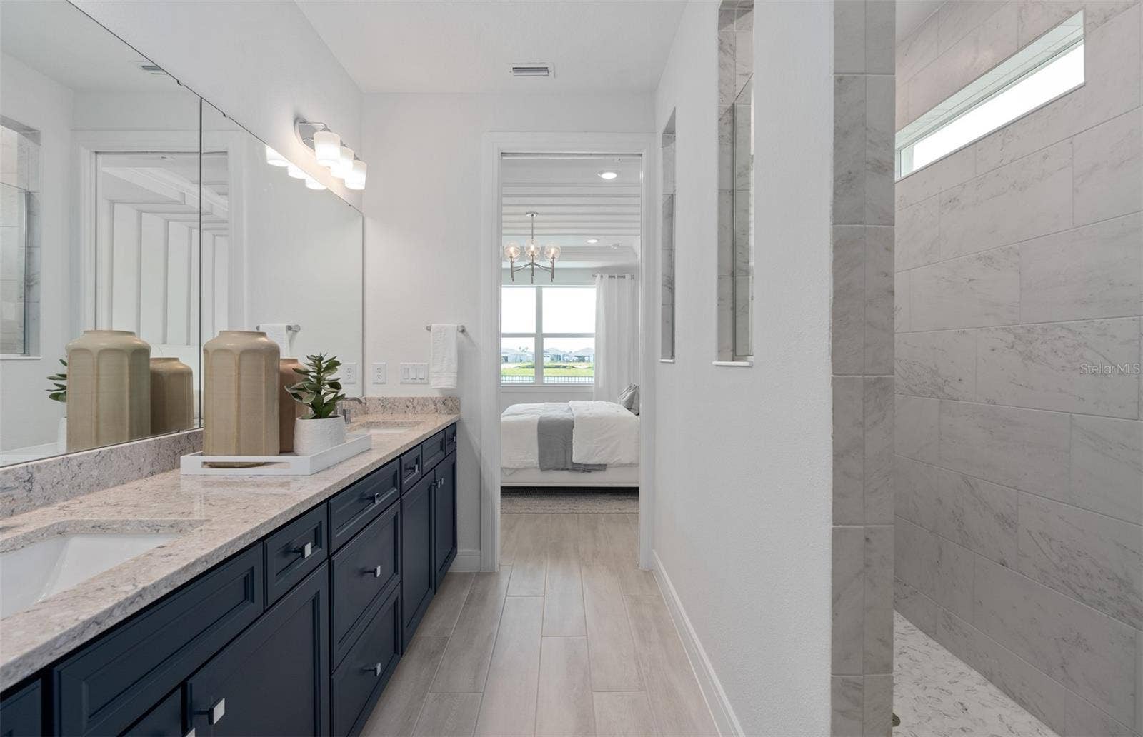 1313 ZESTY CITRUS LANE, Minneola, FL 34715 Model Home Design Only. Pictures and furnishings are for illustrative purposes only. Elevations, colors and options may vary. Furniture is for model home staging only.