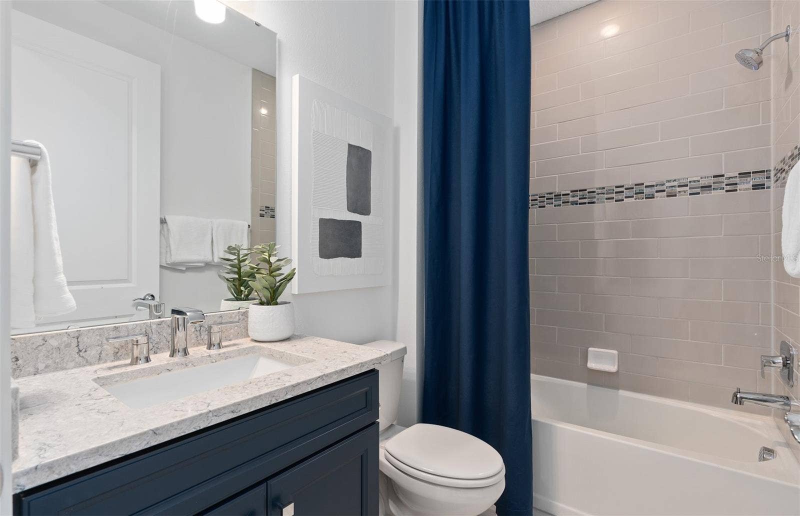 1313 ZESTY CITRUS LANE, Minneola, FL 34715 Model Home Design Only. Pictures and furnishings are for illustrative purposes only. Elevations, colors and options may vary. Furniture is for model home staging only.