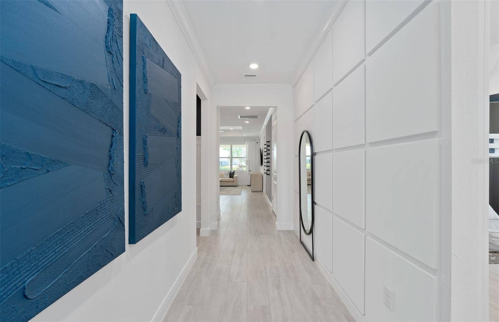 1313 ZESTY CITRUS LANE, Minneola, FL 34715 Model Home Design Only. Pictures and furnishings are for illustrative purposes only. Elevations, colors and options may vary. Furniture is for model home staging only.