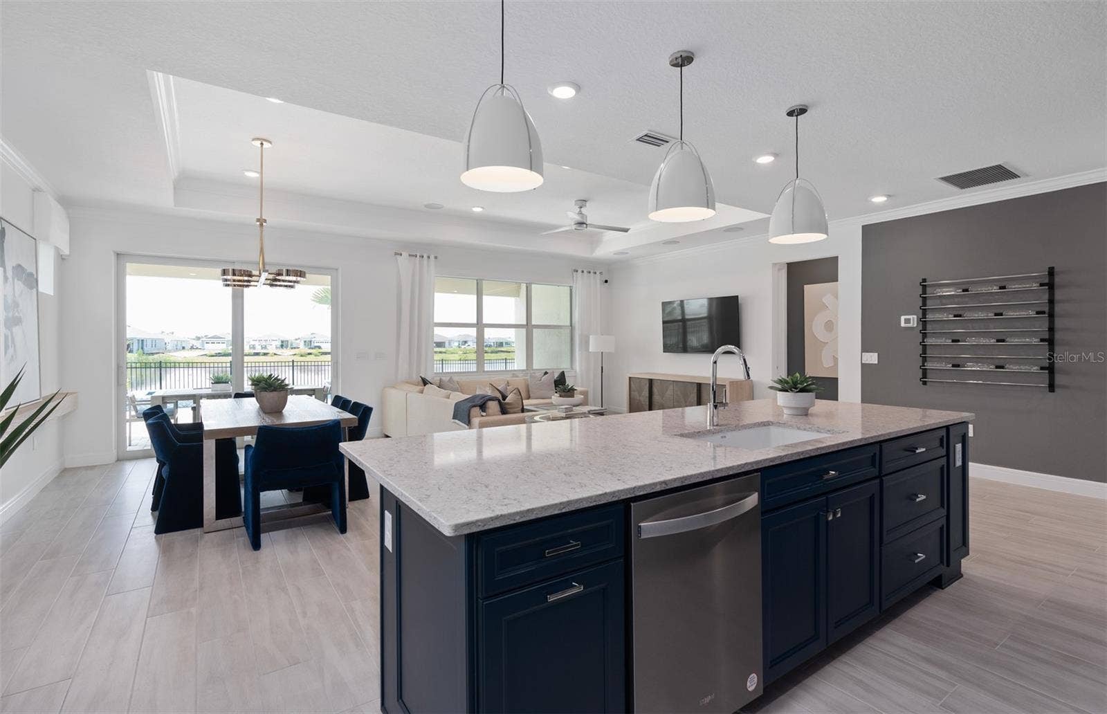 1313 ZESTY CITRUS LANE, Minneola, FL 34715 Model Home Design Only. Pictures and furnishings are for illustrative purposes only. Elevations, colors and options may vary. Furniture is for model home staging only.
