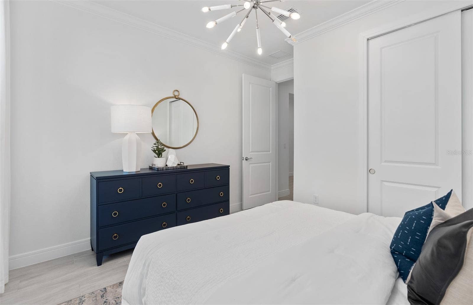 1313 ZESTY CITRUS LANE, Minneola, FL 34715 Model Home Design Only. Pictures and furnishings are for illustrative purposes only. Elevations, colors and options may vary. Furniture is for model home staging only.