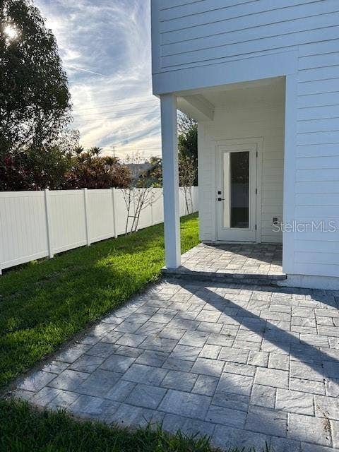 2051 PEEL AVENUE, Orlando, FL 32806 back covered patio with storage closet
