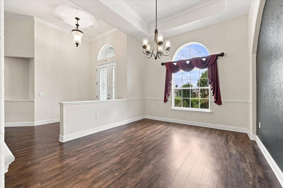230 LAKE ARIETTA COURT, Auburndale, FL 33823 entryway and dining room