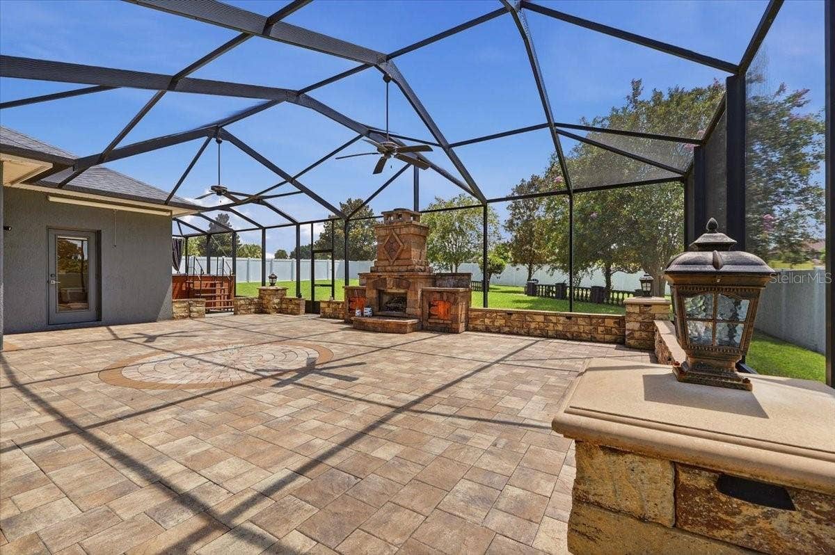 230 LAKE ARIETTA COURT, Auburndale, FL 33823 screened lanai