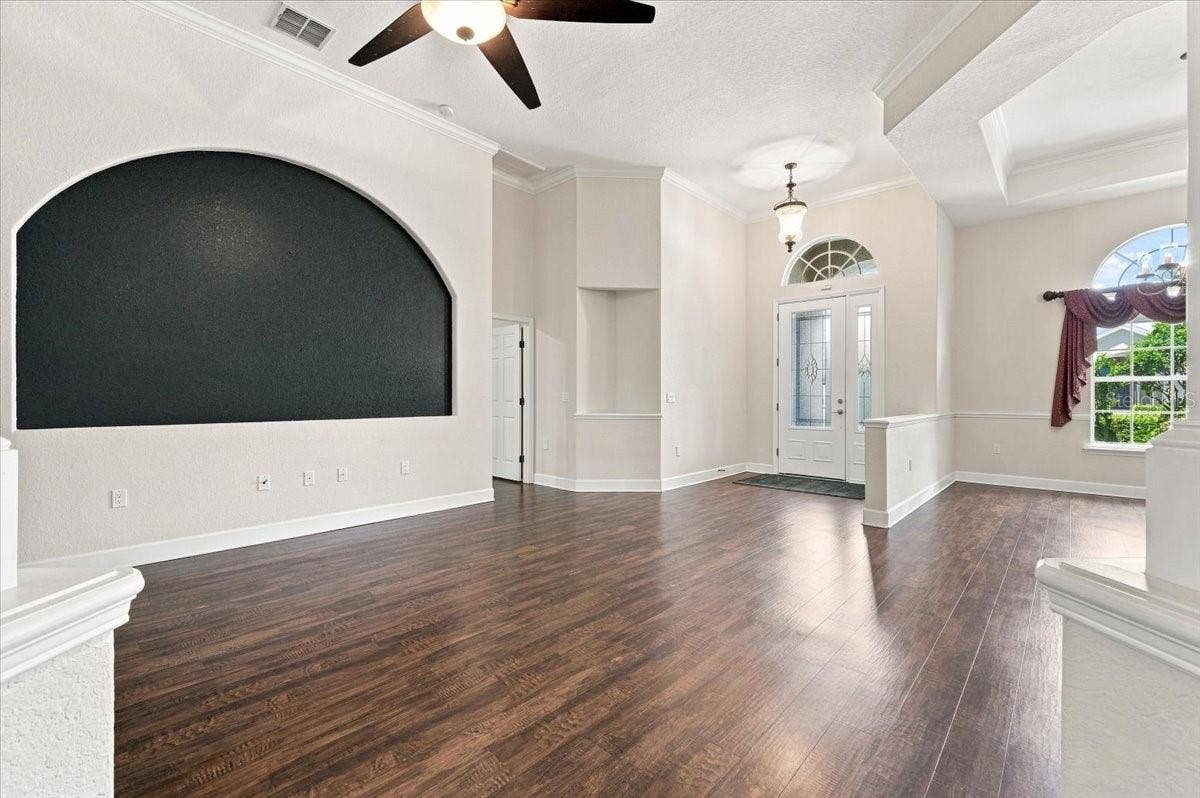 230 LAKE ARIETTA COURT, Auburndale, FL 33823 entryway, living room, dining room