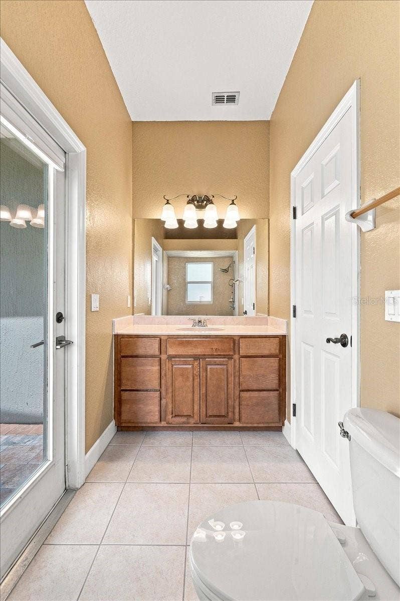 230 LAKE ARIETTA COURT, Auburndale, FL 33823 guest bath