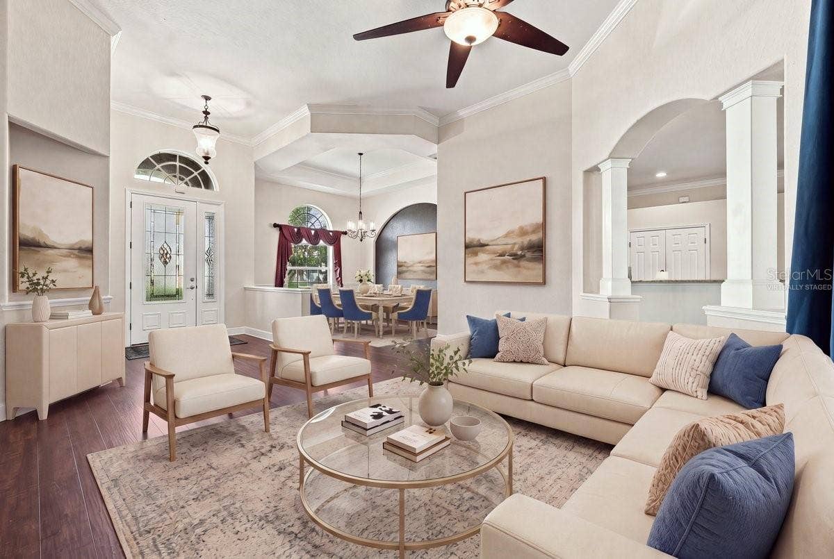 230 LAKE ARIETTA COURT, Auburndale, FL 33823 livingroom, dining room, virtually staged