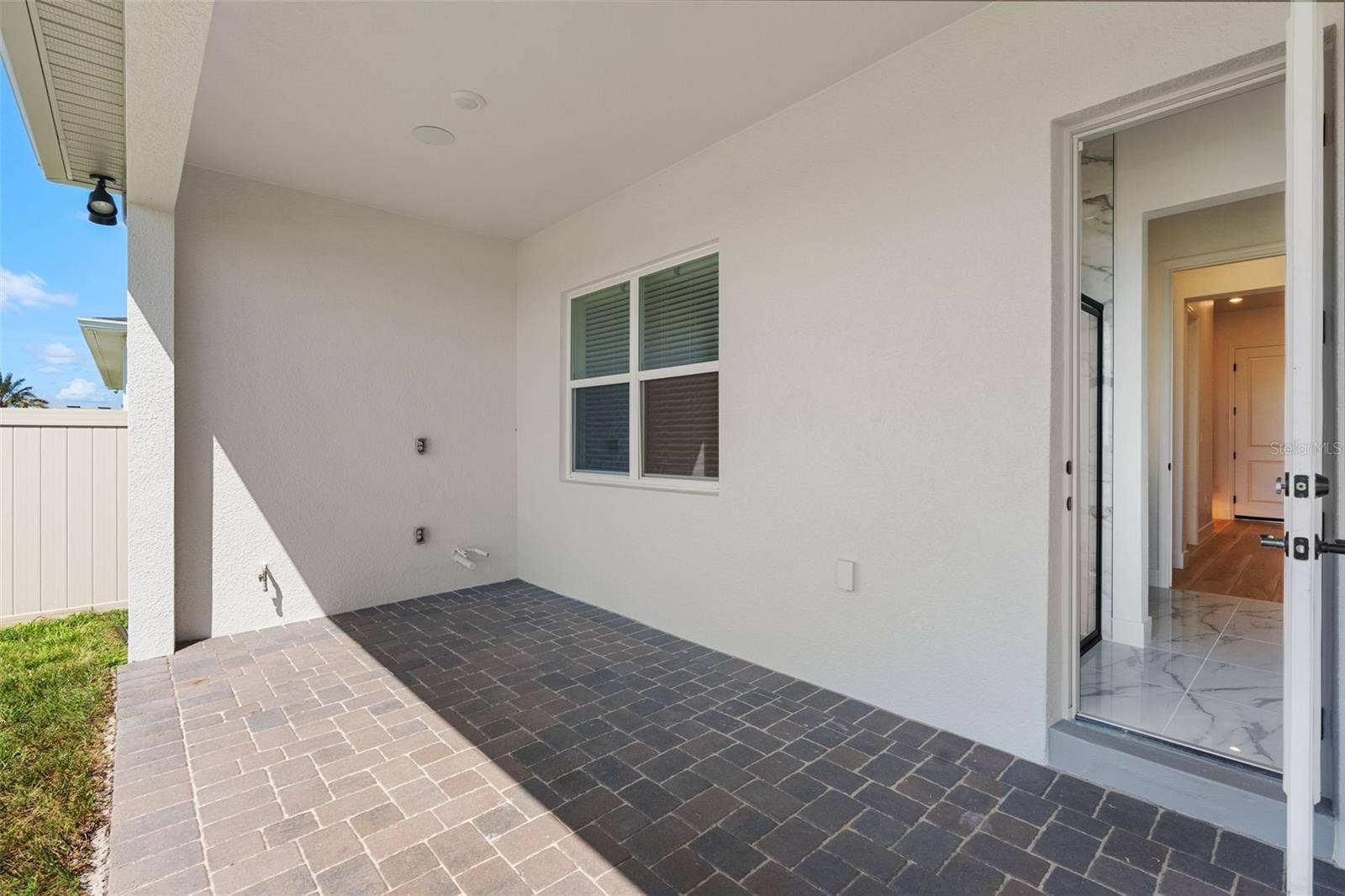 4617 GOLDEN BIRCH AVENUE, Clermont, FL 34714 Lanai it outfit for a summer kitchen.