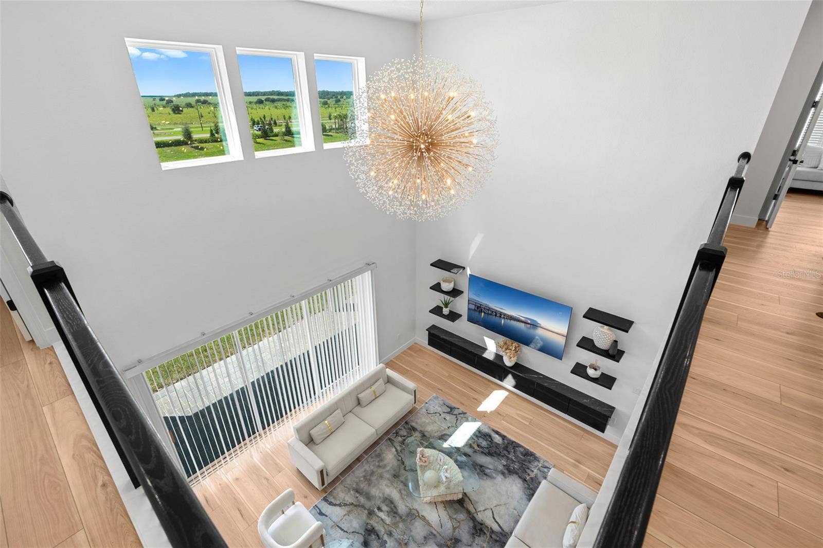 4617 GOLDEN BIRCH AVENUE, Clermont, FL 34714 Chic light fixtures, elevated spaces.