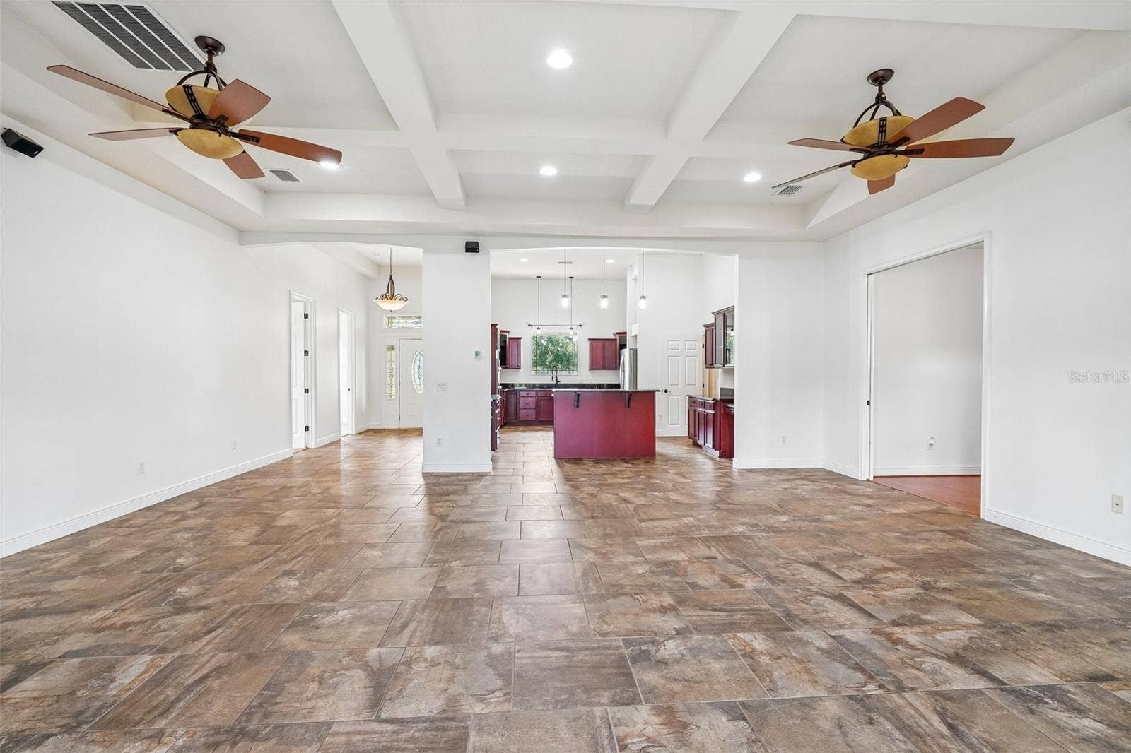 1113 MYRTLE BREEZES CT, Fruitland Park, FL 34731 Family/Dining Combo looking into kitchen