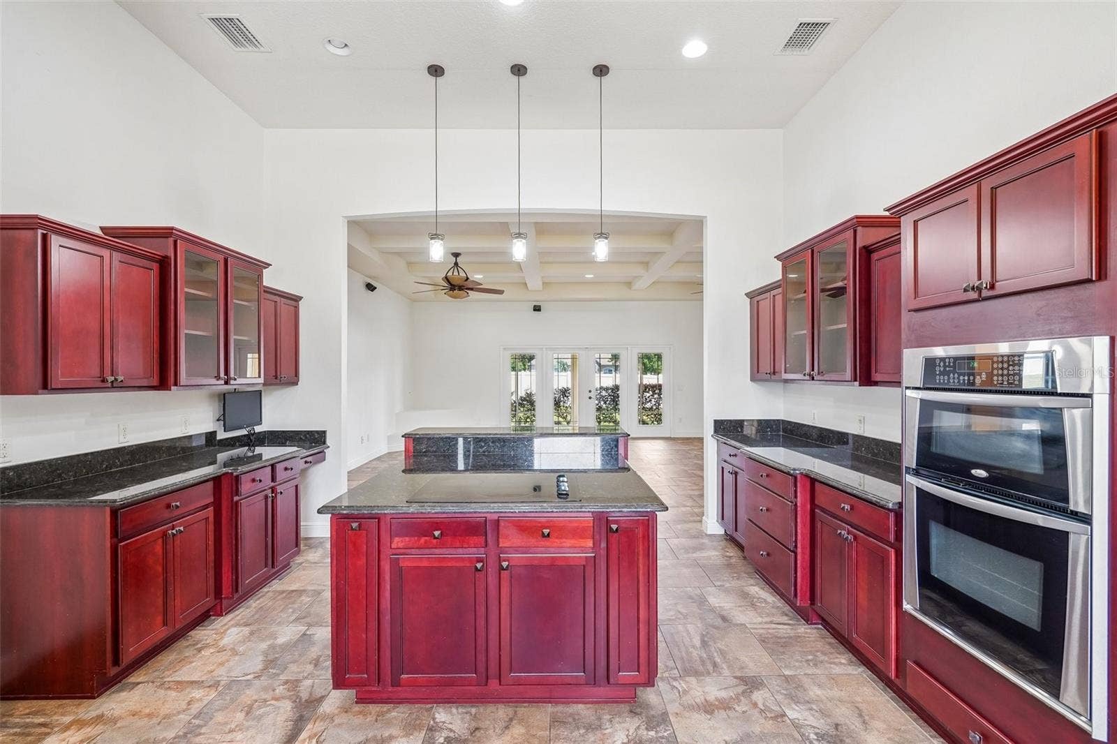 1113 MYRTLE BREEZES CT, Fruitland Park, FL 34731 Kitchen looking into Family/Dining Combo