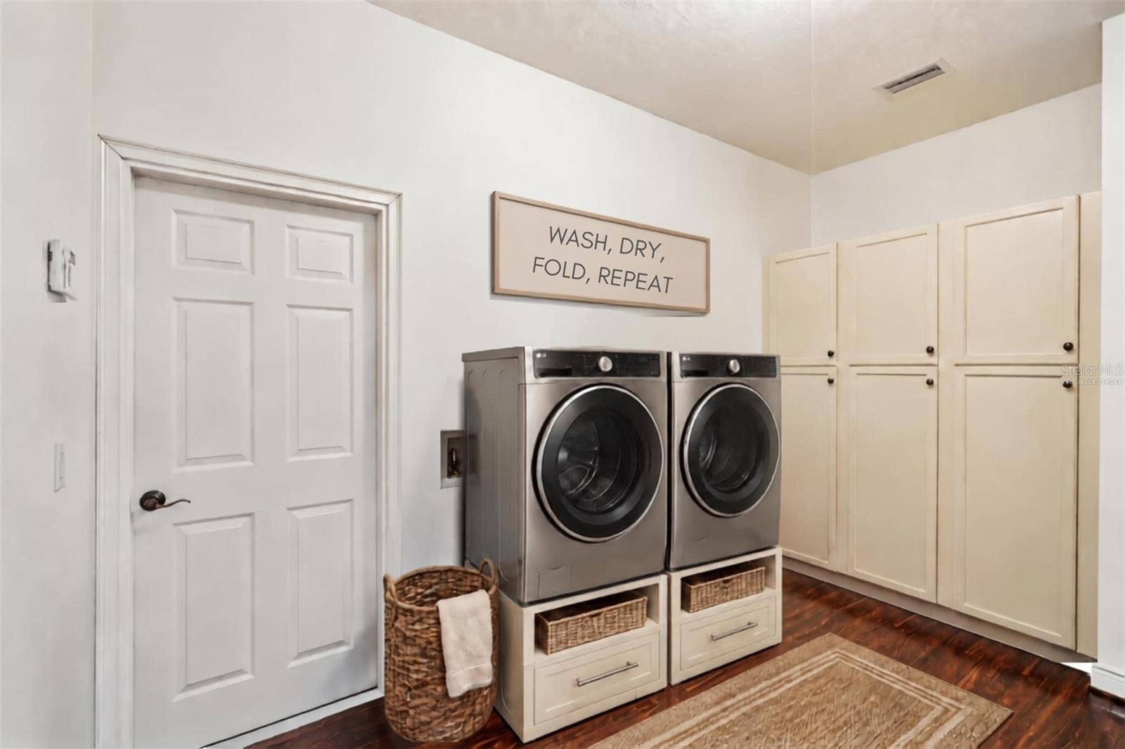 1113 MYRTLE BREEZES CT, Fruitland Park, FL 34731 Virtually staged Laundry room