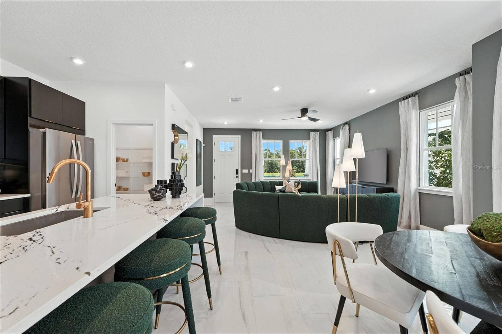 1907 SEAWALL WAY, Celebration, FL 34747 Island Village Anastasia Model Dining Room, Kitchen and Great Room