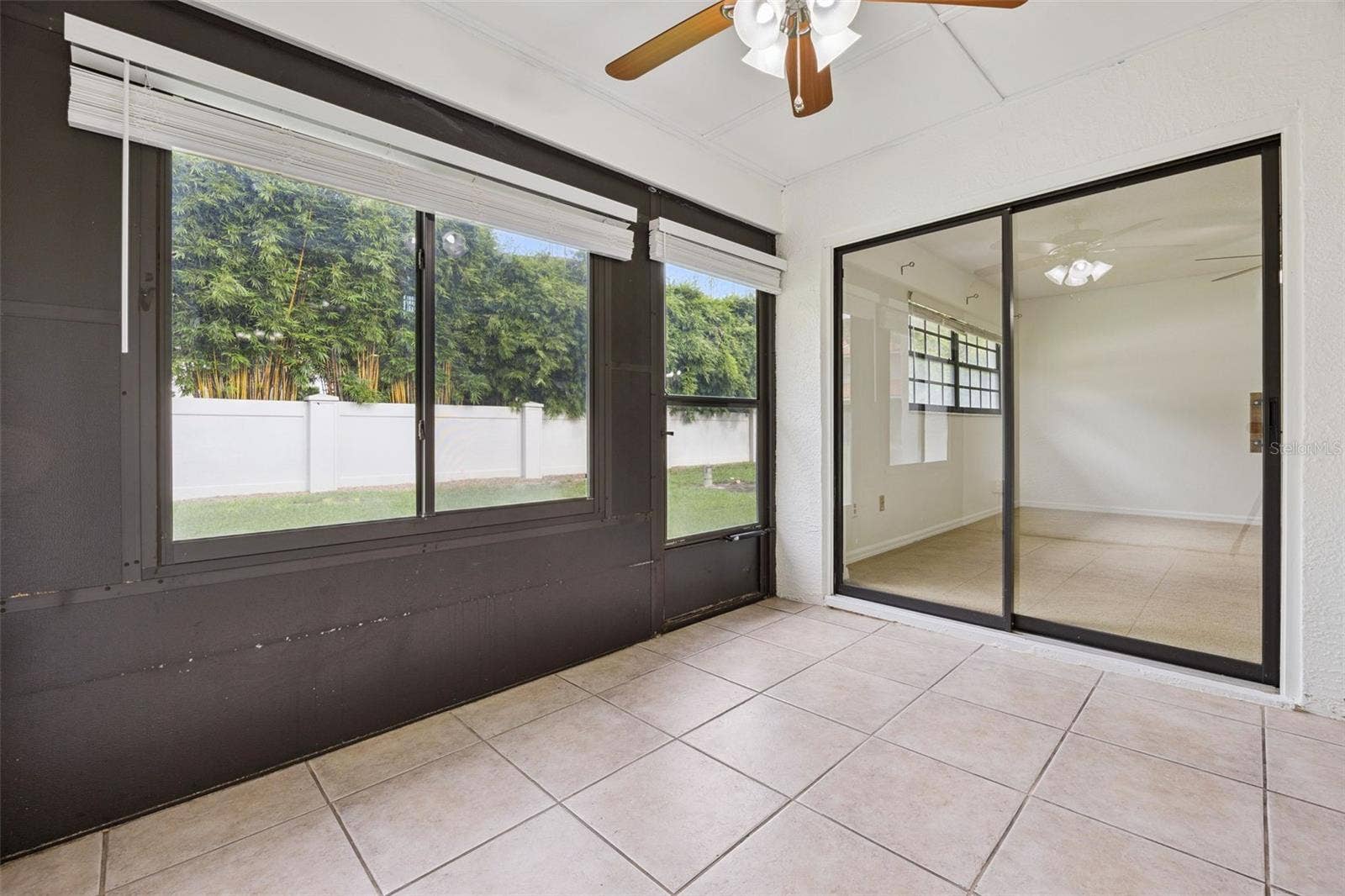 8370 SANDPOINT BLVD, Orlando, FL 32819 Lanai with access to primary bedroom and living room
