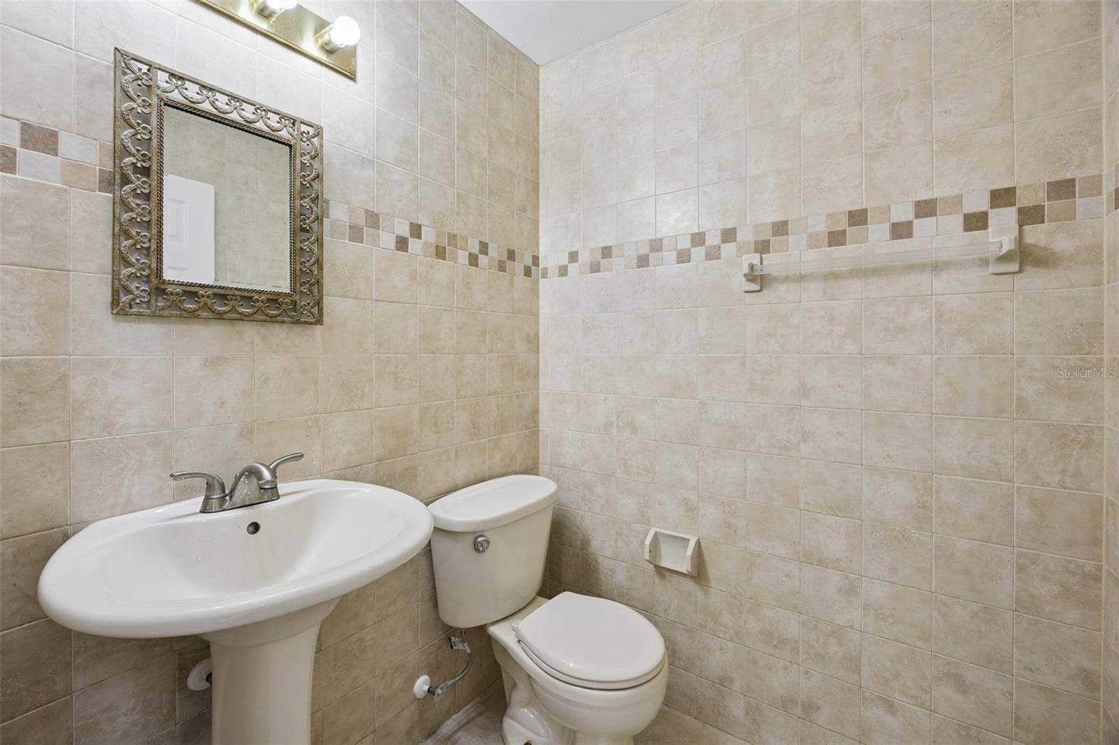 8370 SANDPOINT BLVD, Orlando, FL 32819 Half bath-1st floor