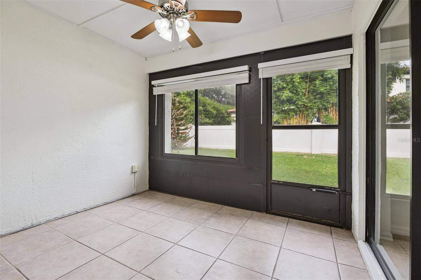 8370 SANDPOINT BLVD, Orlando, FL 32819 Lanai with access to primary bedroom and living room