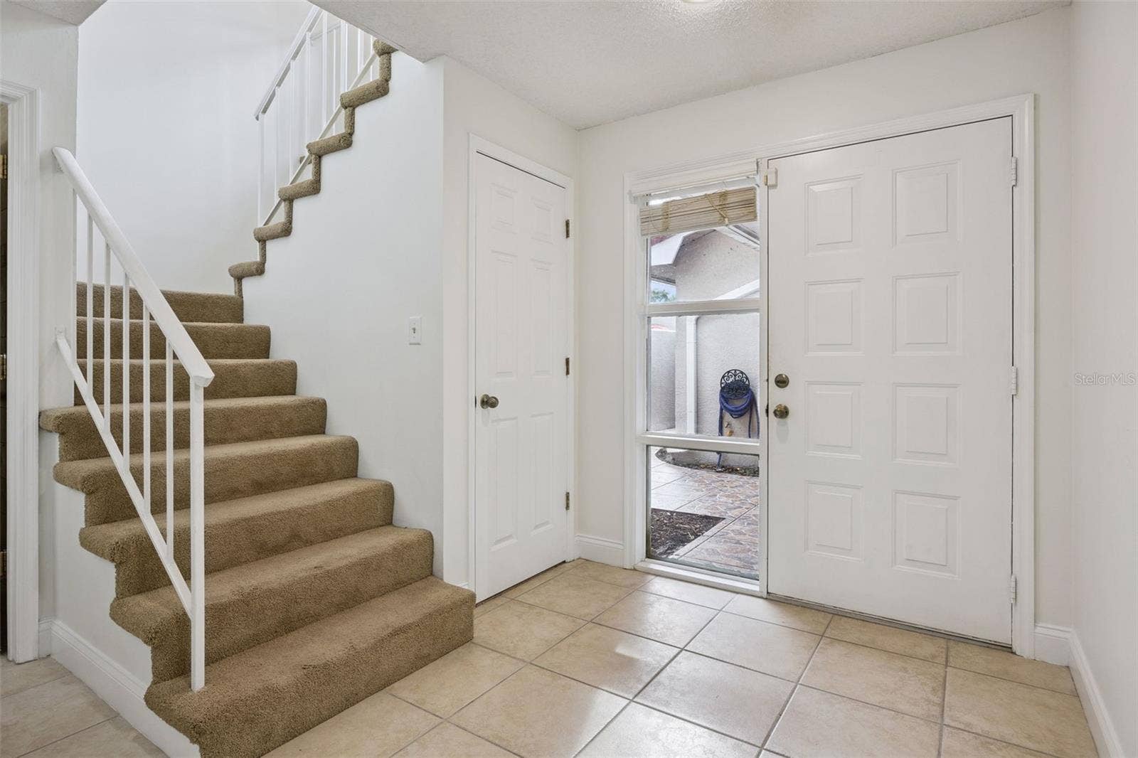 8370 SANDPOINT BLVD, Orlando, FL 32819 Foyer