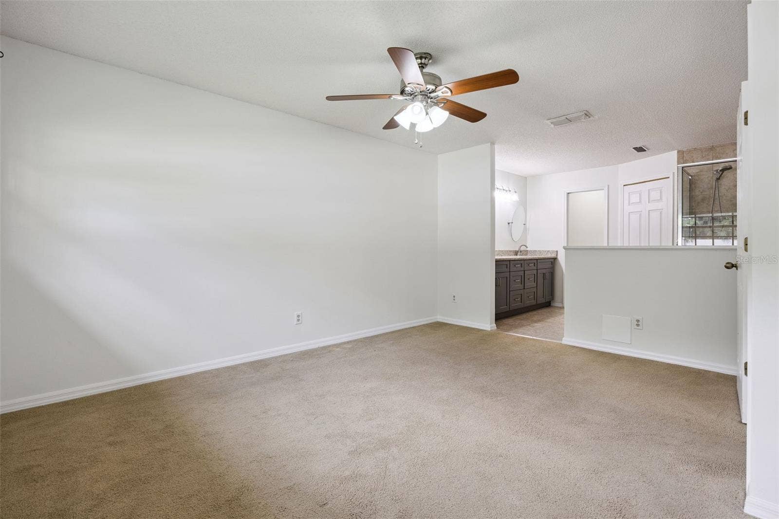 8370 SANDPOINT BLVD, Orlando, FL 32819 Primary bedroom