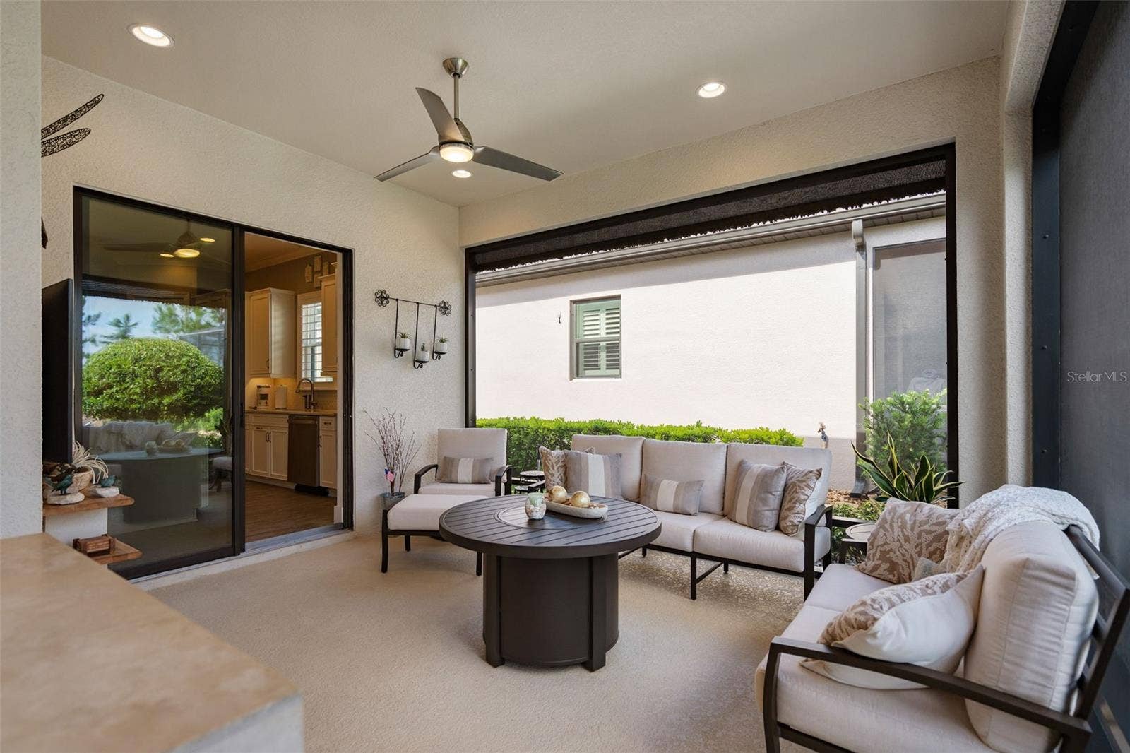 1279 ZEEK RIDGE STREET, Clermont, FL 34715 Screened lanai to kick back and relax with family and friends. This extends the indoor entertaining area to the outside.