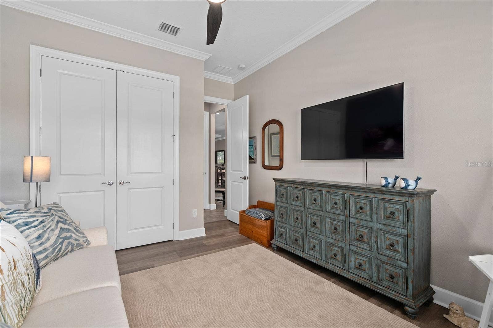 1279 ZEEK RIDGE STREET, Clermont, FL 34715 Bedroom 3 with a closet organization system.
