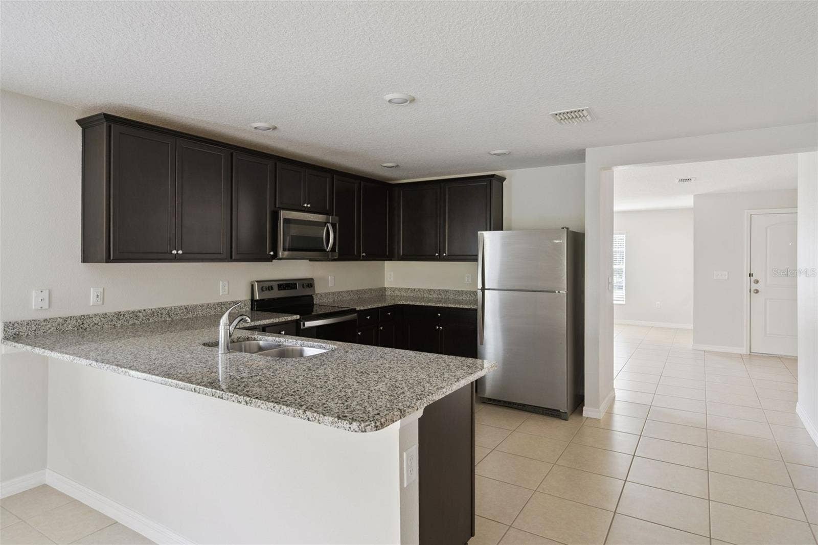 1602 ORNE STREET, Mascotte, FL 34753