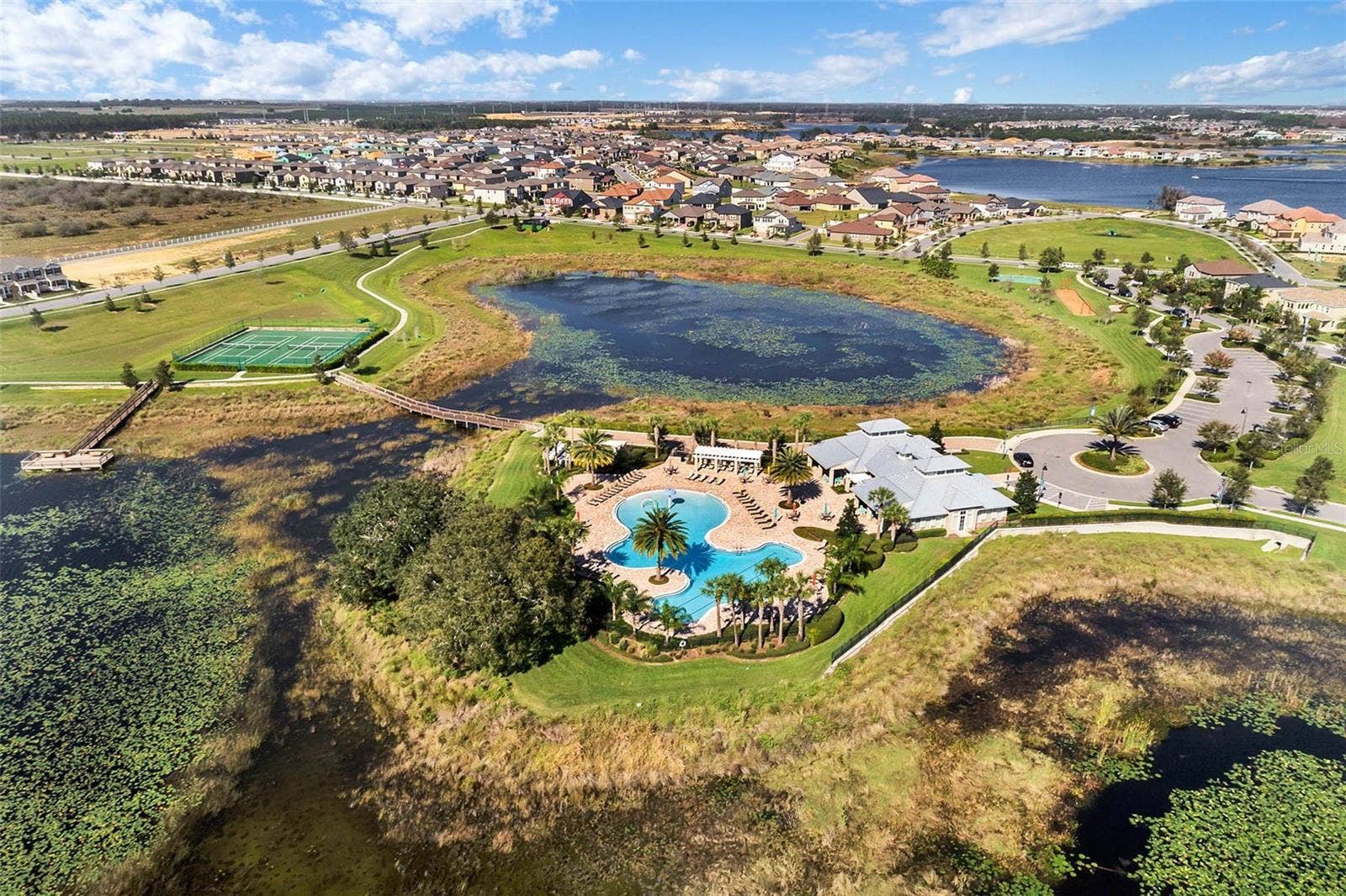 8001 POND APPLE DRIVE, Winter Garden, FL 34787 Resort amenities are literally across the street