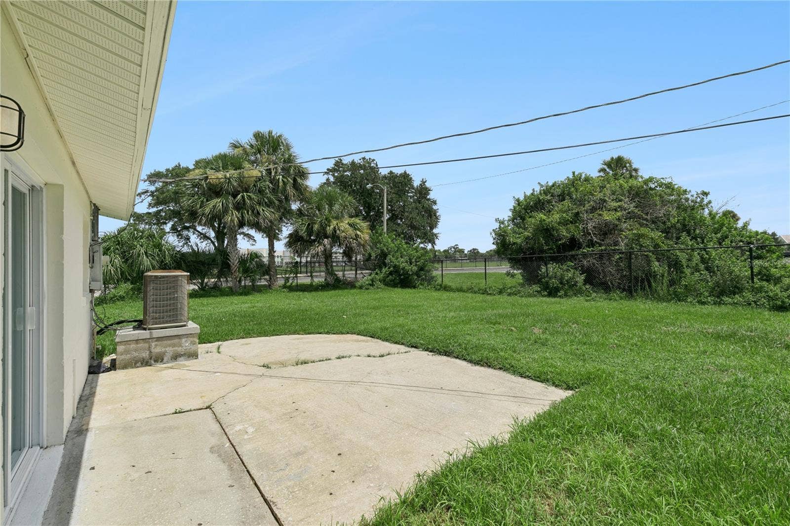 875 LOOMIS AVENUE, Daytona Beach, FL 32114 Patio Overlooking Oversized Backyard