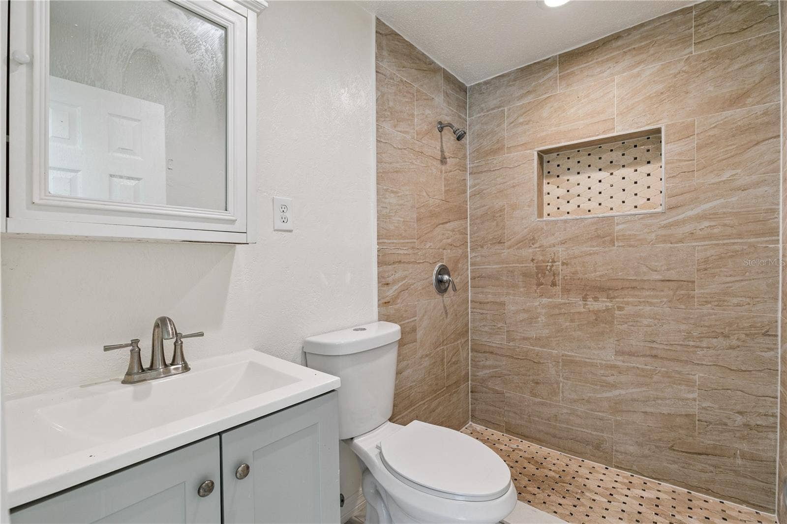 875 LOOMIS AVENUE, Daytona Beach, FL 32114 Bathroom with Walk-In Shower