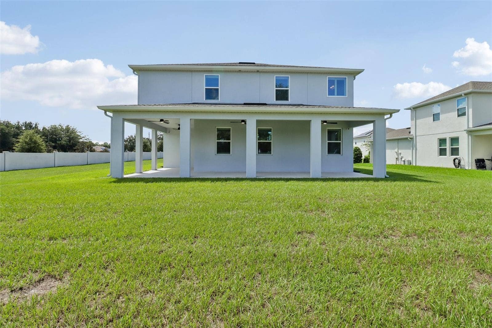 2985 WATER CLOVER COURT, Apopka, FL 32712 Wrap around lanai overlooks a large yard.