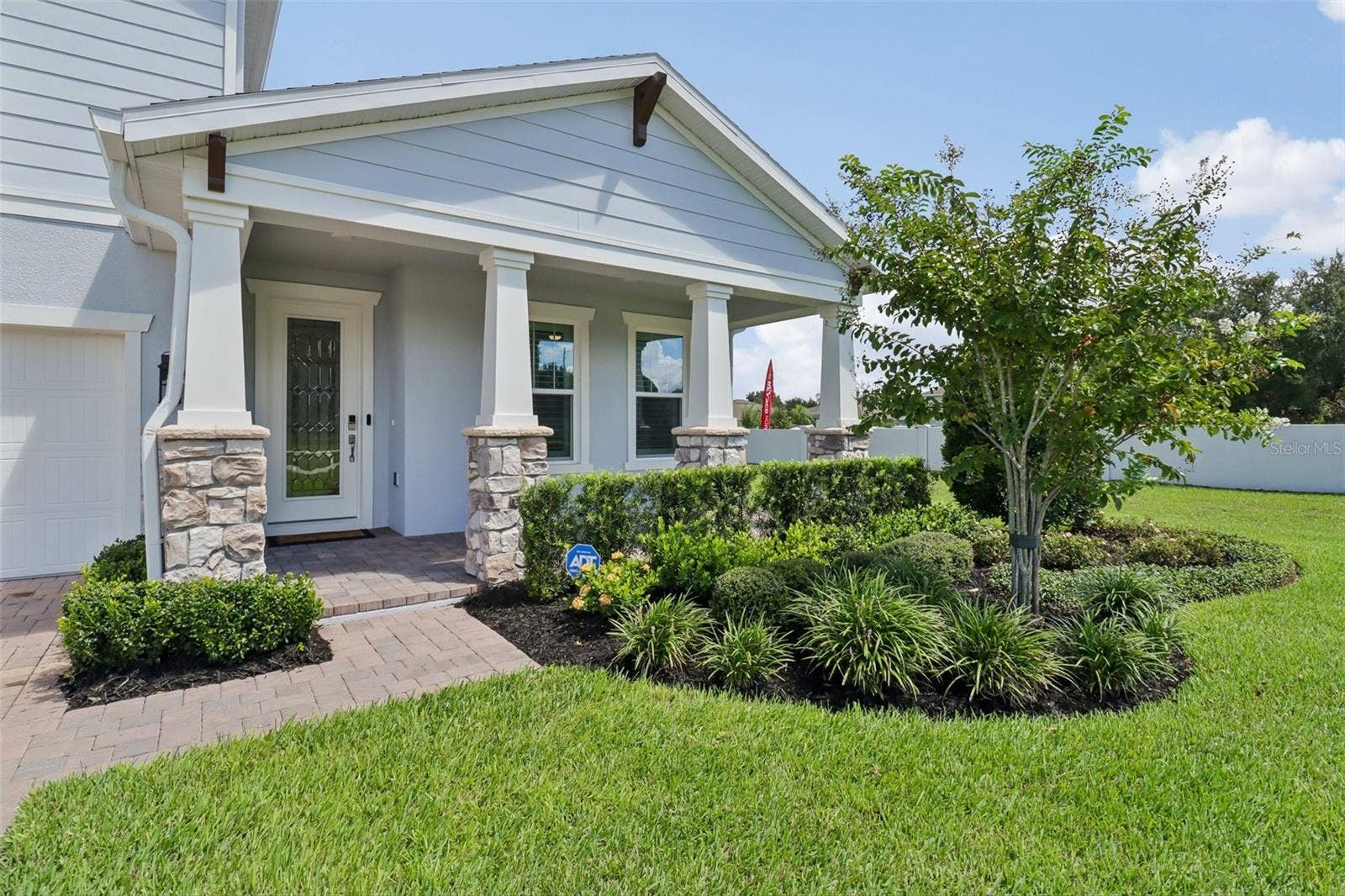 2985 WATER CLOVER COURT, Apopka, FL 32712 Manicured front entry, covered front porch.