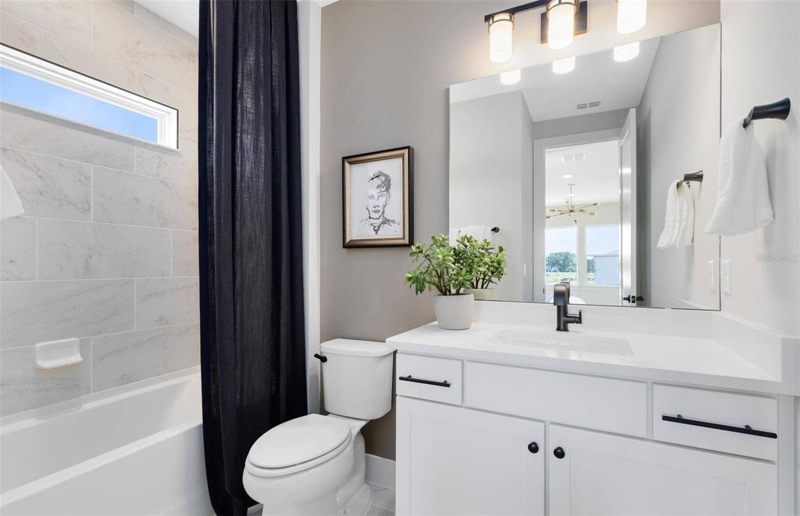 16920 LONE OAK CIRCLE, Orlando, FL 32832 Actual home photo. Colors, finishes, textures and options may appear differently in person due to variations in monitors and viewing devices.