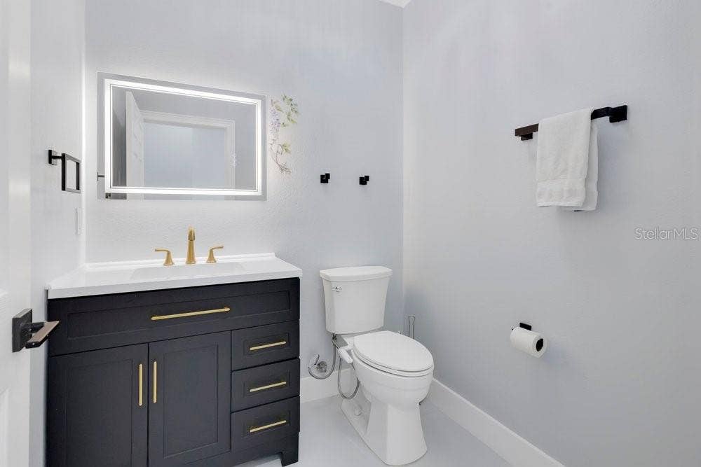 7149 REGINA WAY, Orlando, FL 32819 Powder Bath on first floor