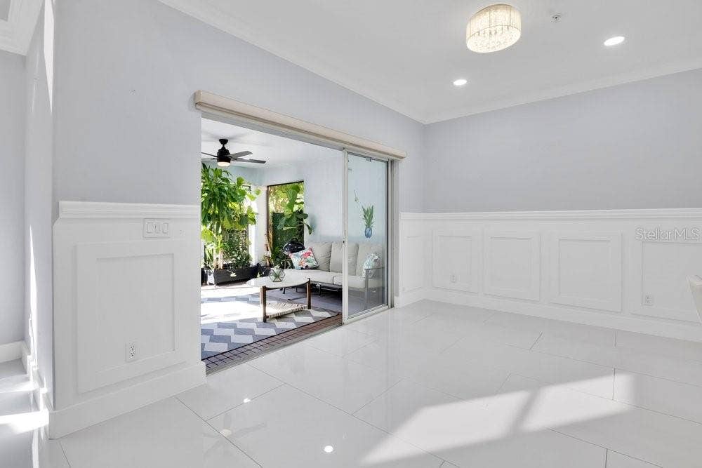 7149 REGINA WAY, Orlando, FL 32819 Sunny dinette opens to screened porch