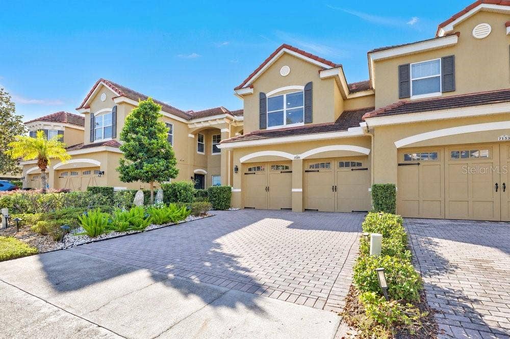 7149 REGINA WAY, Orlando, FL 32819 Air conditioned 2 car garage