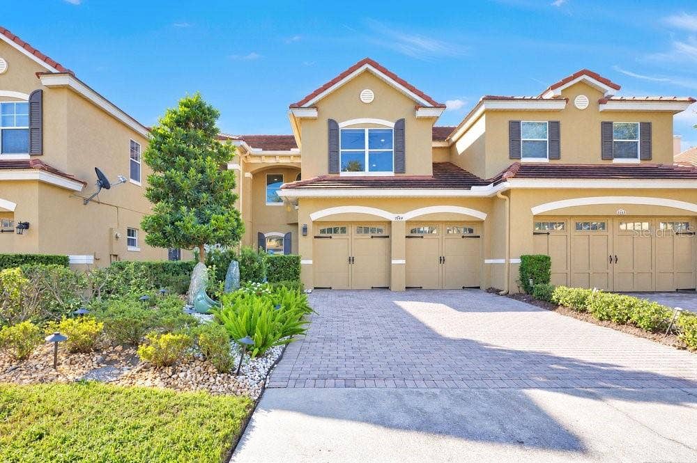 7149 REGINA WAY, Orlando, FL 32819 Front Facade