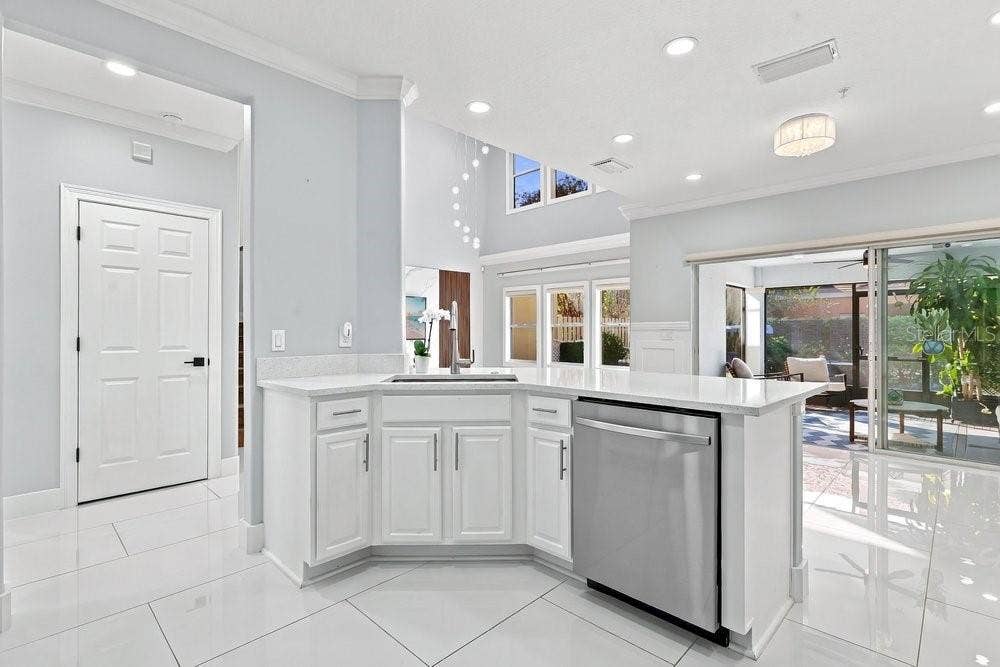 7149 REGINA WAY, Orlando, FL 32819 Drenched in natural light