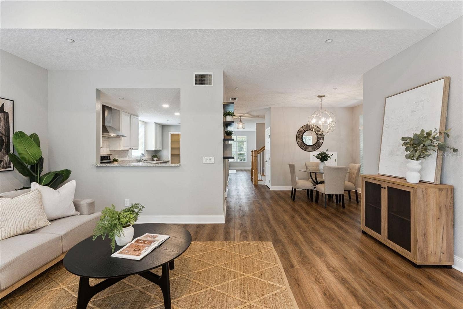 2516 E CHURCH STREET, Orlando, FL 32803 Open living and dining and a kitchen that keeps you connected.