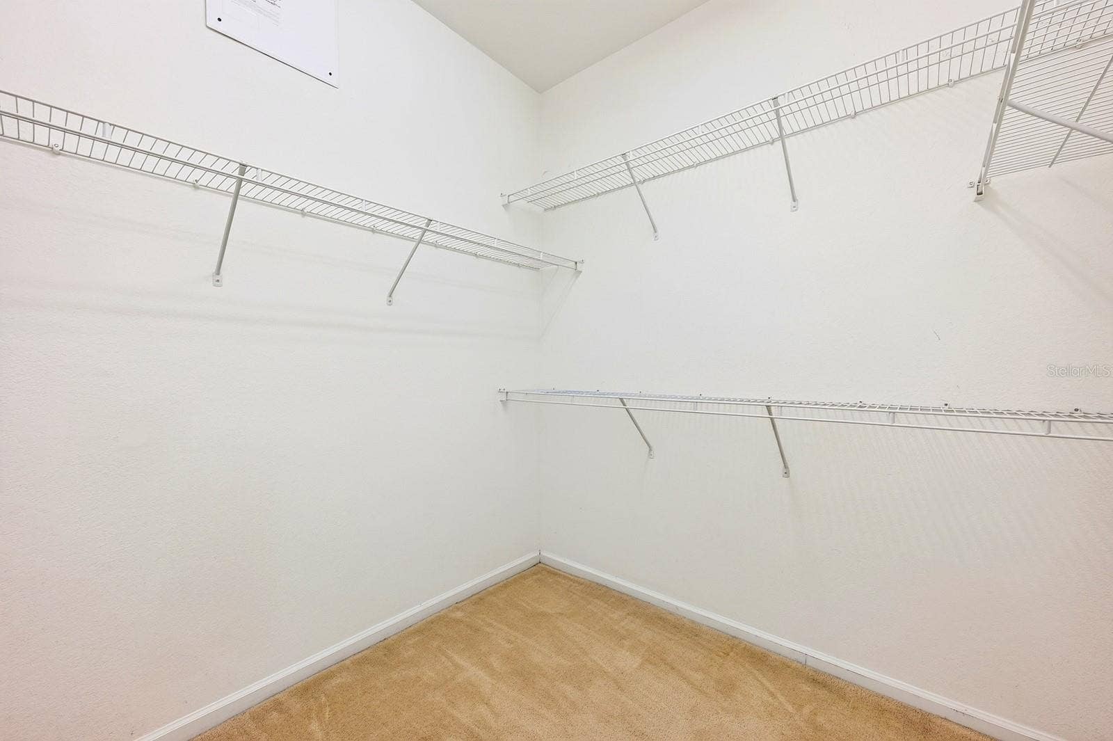 13424 HOPKINTON COURT, Windermere, FL 34786 Primary suite walk-in closet.