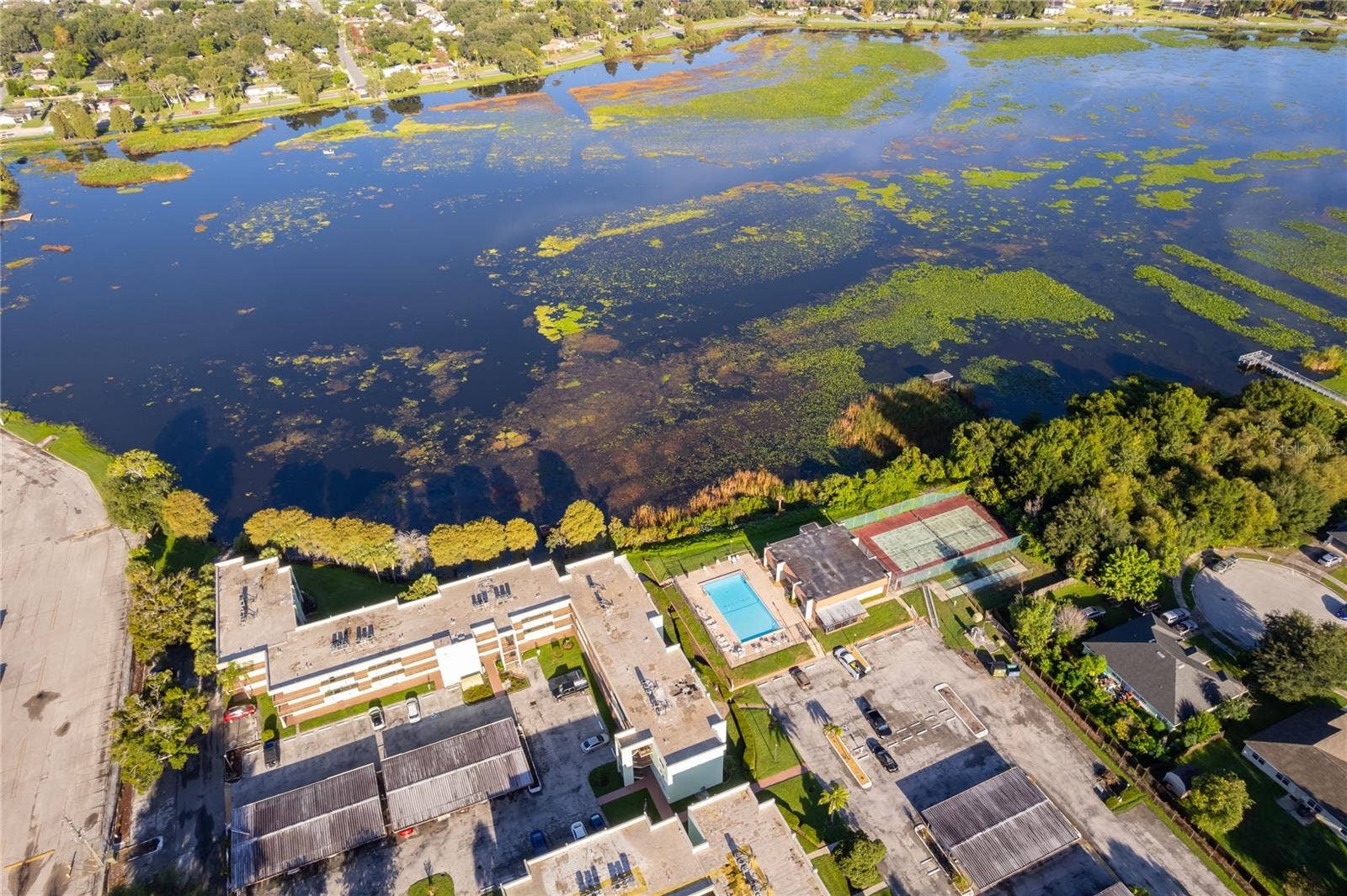 1130 N LAKE PARKER AVENUE, #C126, Lakeland, FL 33805 Aerial View of Community and Lake