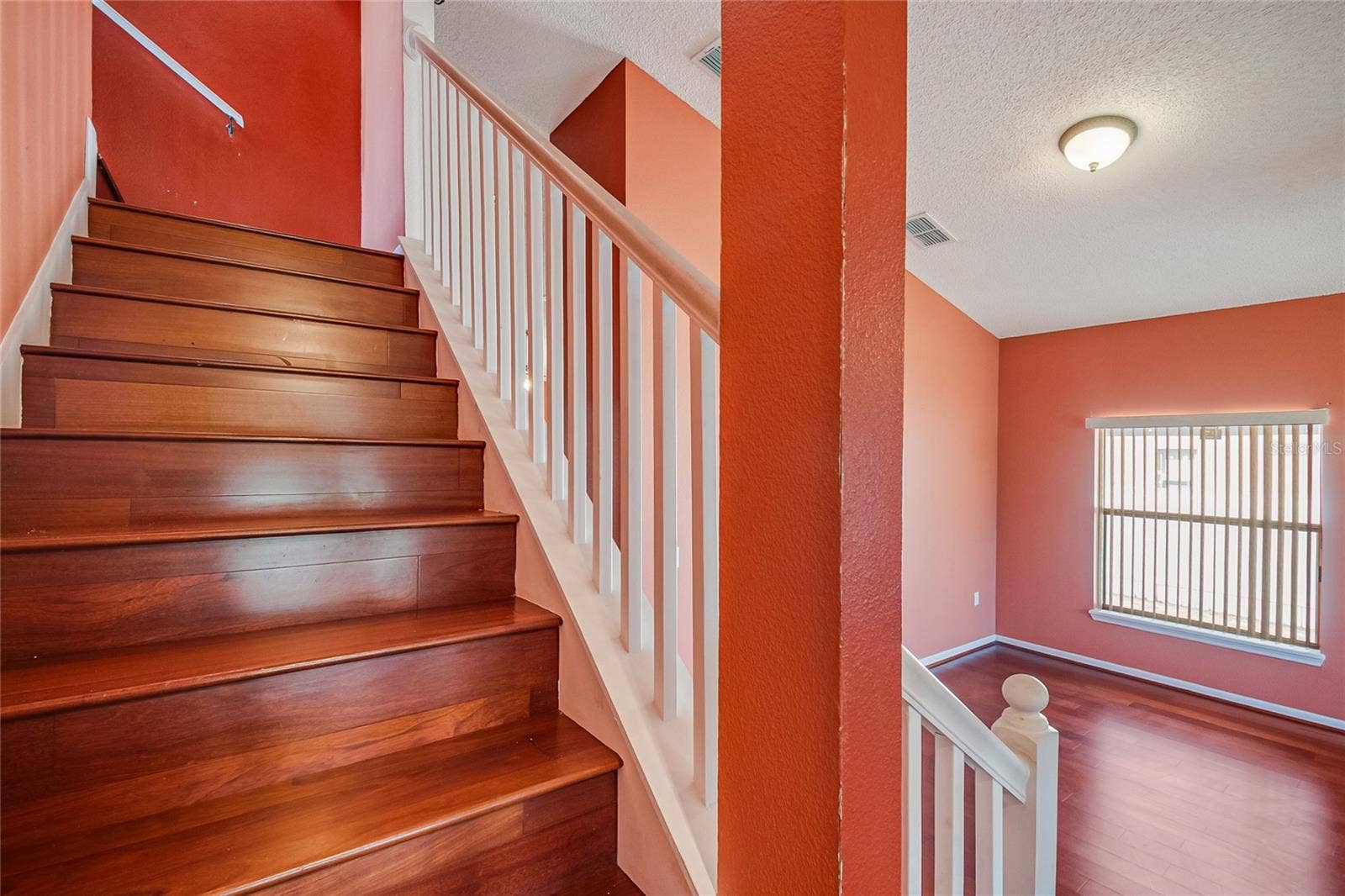 2753 WOODSTREAM CIRCLE, Kissimmee, FL 34743 Staircase with railing