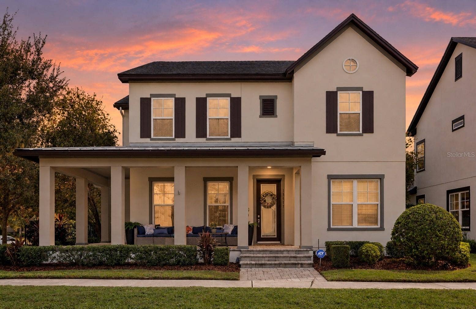13817 ELIOT AVENUE, Orlando, FL 32827 Twilight Exterior